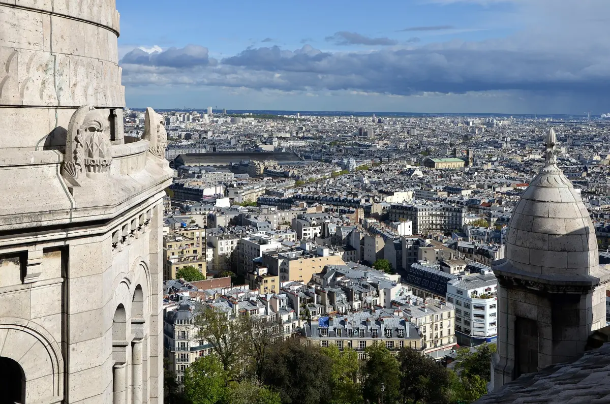 Paris rooftops seen between the small domes